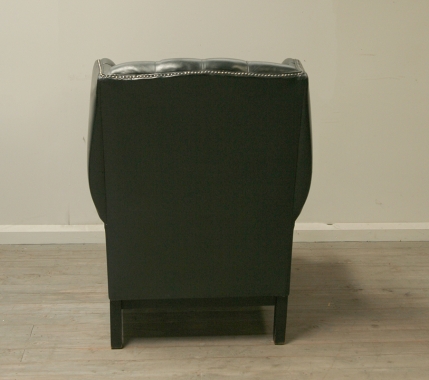 Pair Of Dark Green Leather Wing Chairs 