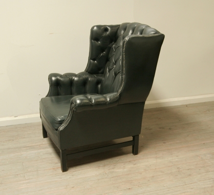 Pair Of Dark Green Leather Wing Chairs 